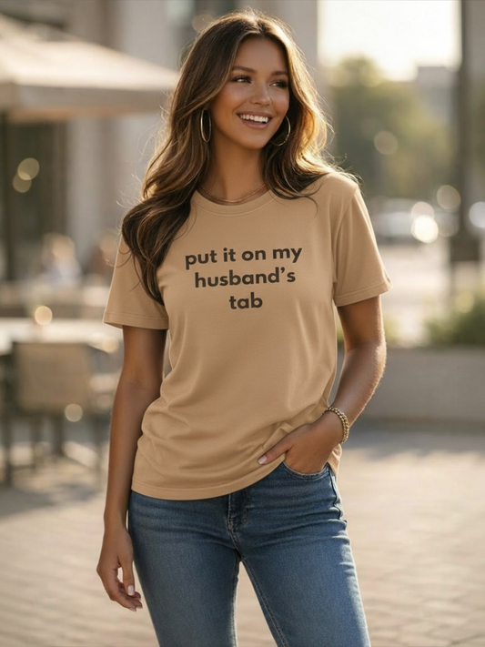 Put It On My Husband’s Tab Tee Shirt-Tan/Brown