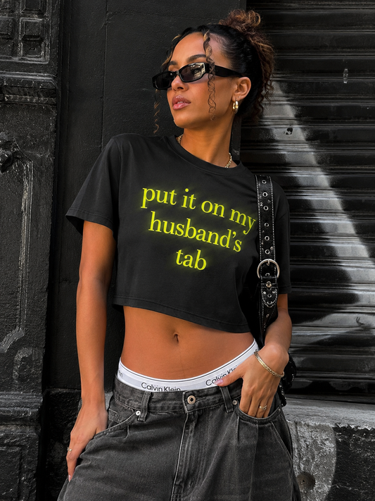Put It On My Husband’s Tab Crop Tee Shirt (Black)