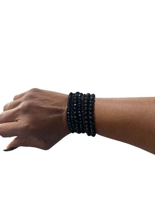 Cluster Of Black Bracelets