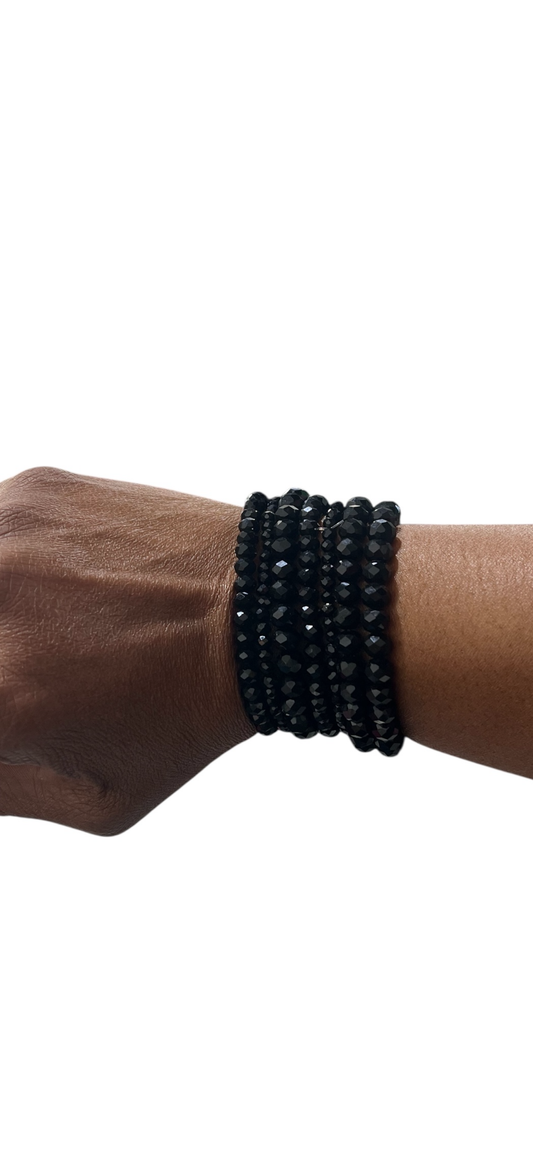 Cluster Of Black Bracelets