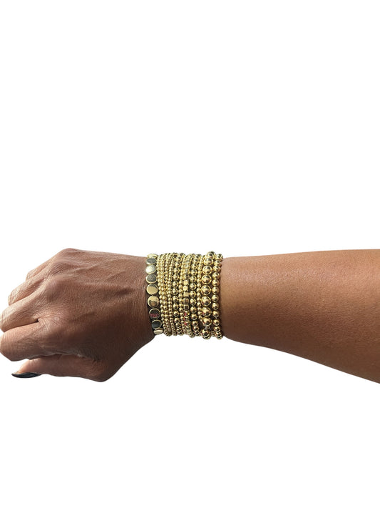 Cluster Of Gold Bracelets